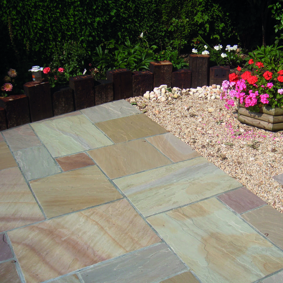 Weathered buff blend paving back garden 