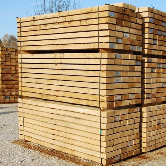 French oak sleepers stacked up in yard