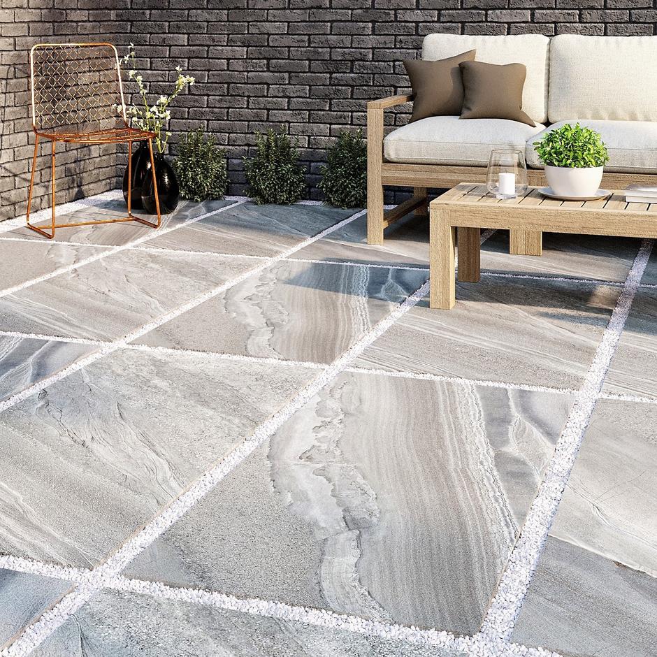 Quartzite Grey Porcelain Paving lounge area and white jointing