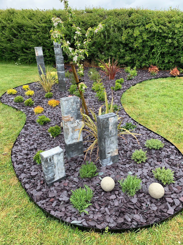 CORE Flexible Steel Edging used as decorative stone border