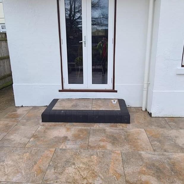Spectrum Burlington Rust Porcelain Paving back garden and step with cobbles