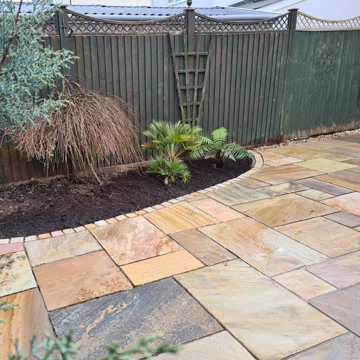 brown and beige garden paving with plants
