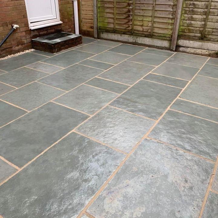 light grey and blue natural stone with stairs and fence