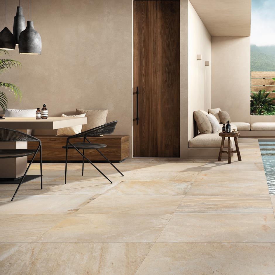 Rocca Fossil Porcelain Paving garden patio dinning area with pool