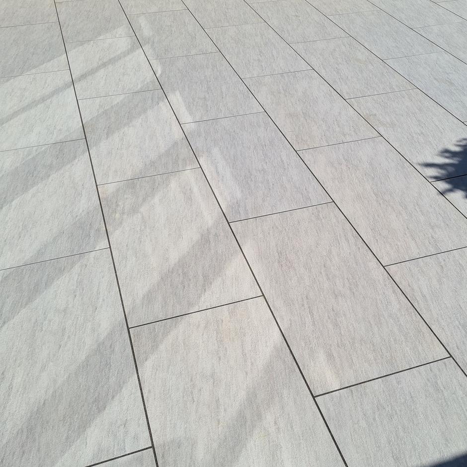 close up grey garden paving