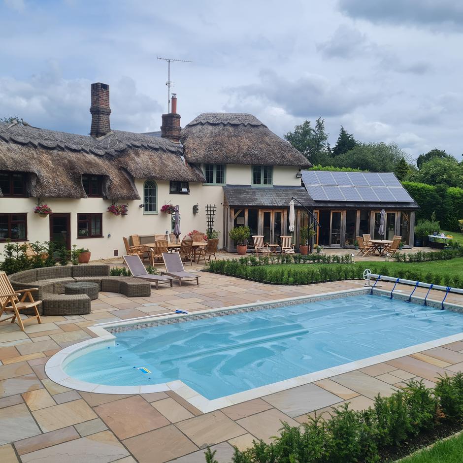 Buff Blend Rippon Sandstone Paving with Swimming Pool