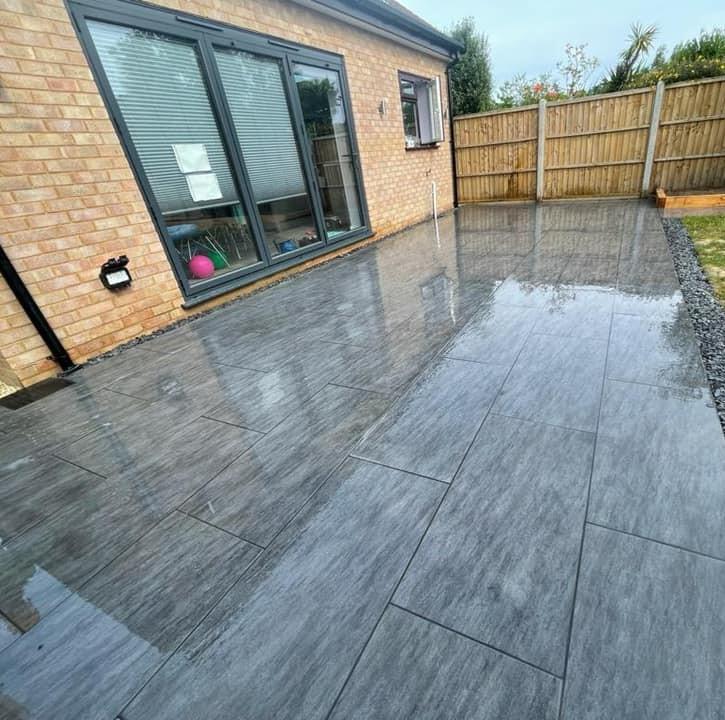 Sienna™ Anthracite Black Porcelain Paving back garden with grouting, wet