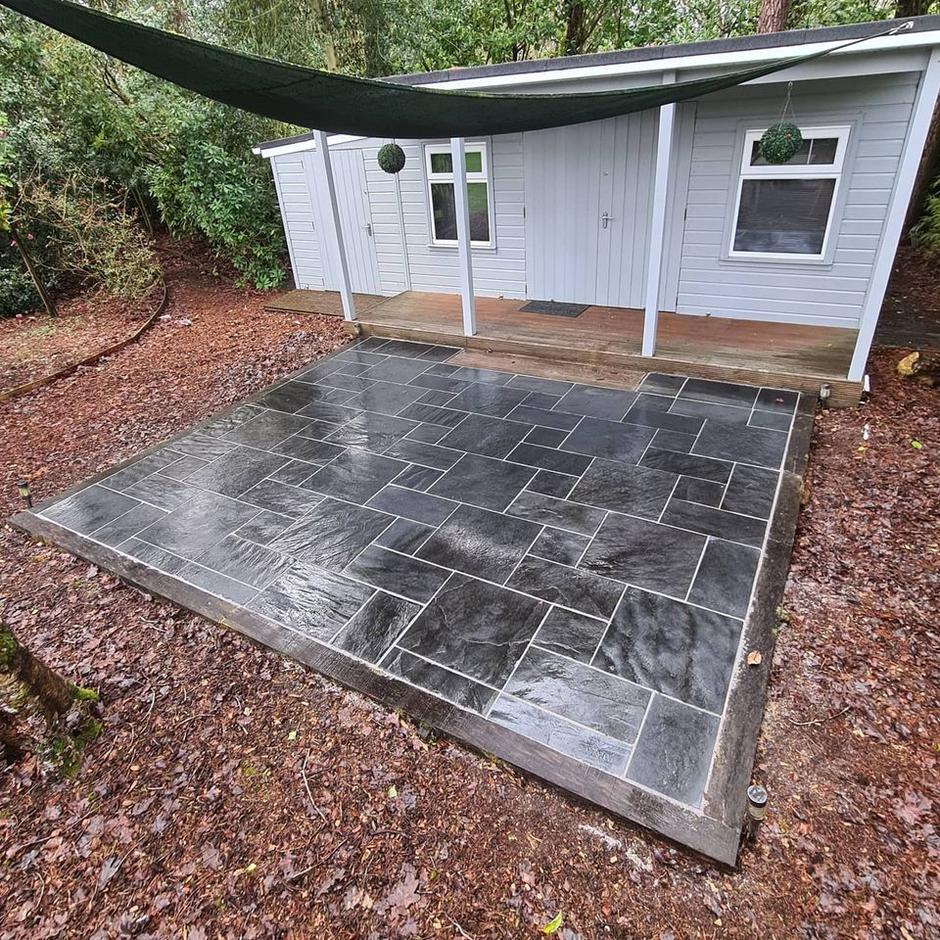 black natural stone garden patio slabs with grout