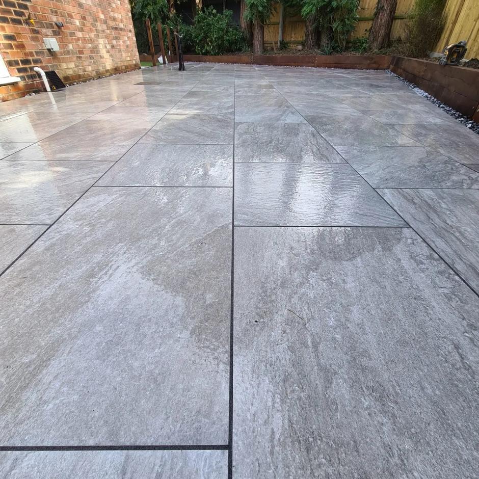 rasa grey porcelain paving slabs in garden