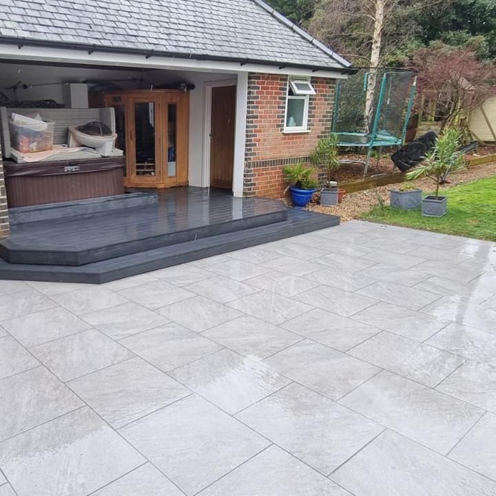grey porcelain paving with decking