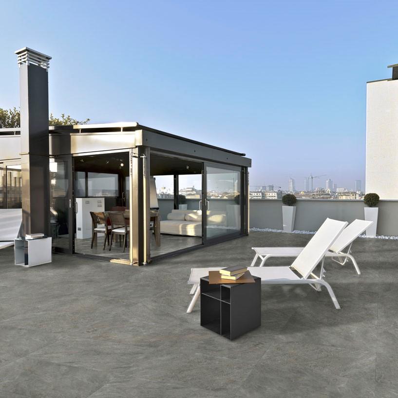 silver grey porcelain paving with deck chairs