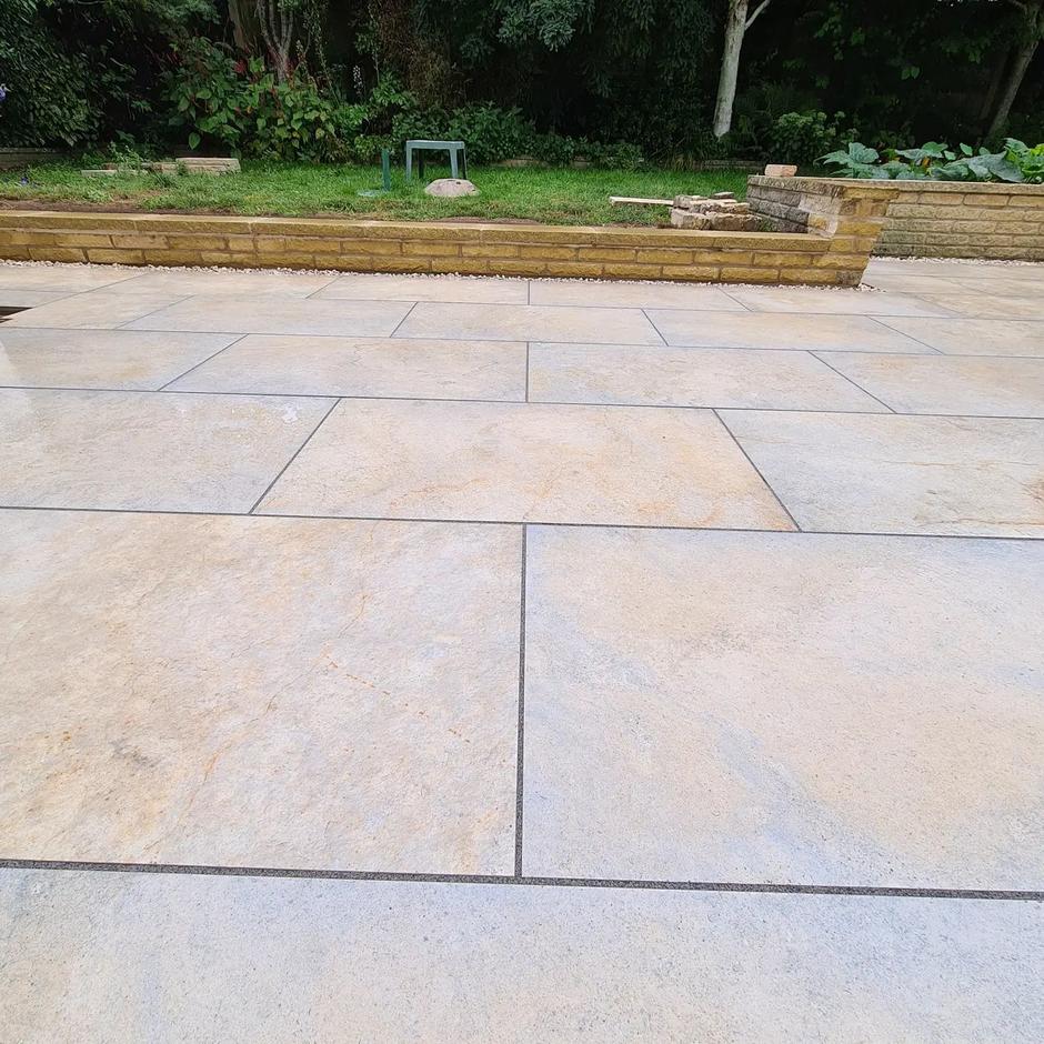 rocca citron porcelain paving slabs laid in garden