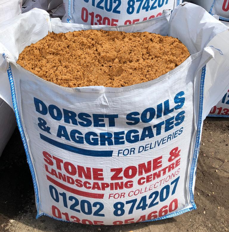 Orange Brick Sand in Stone Zone bulk bag