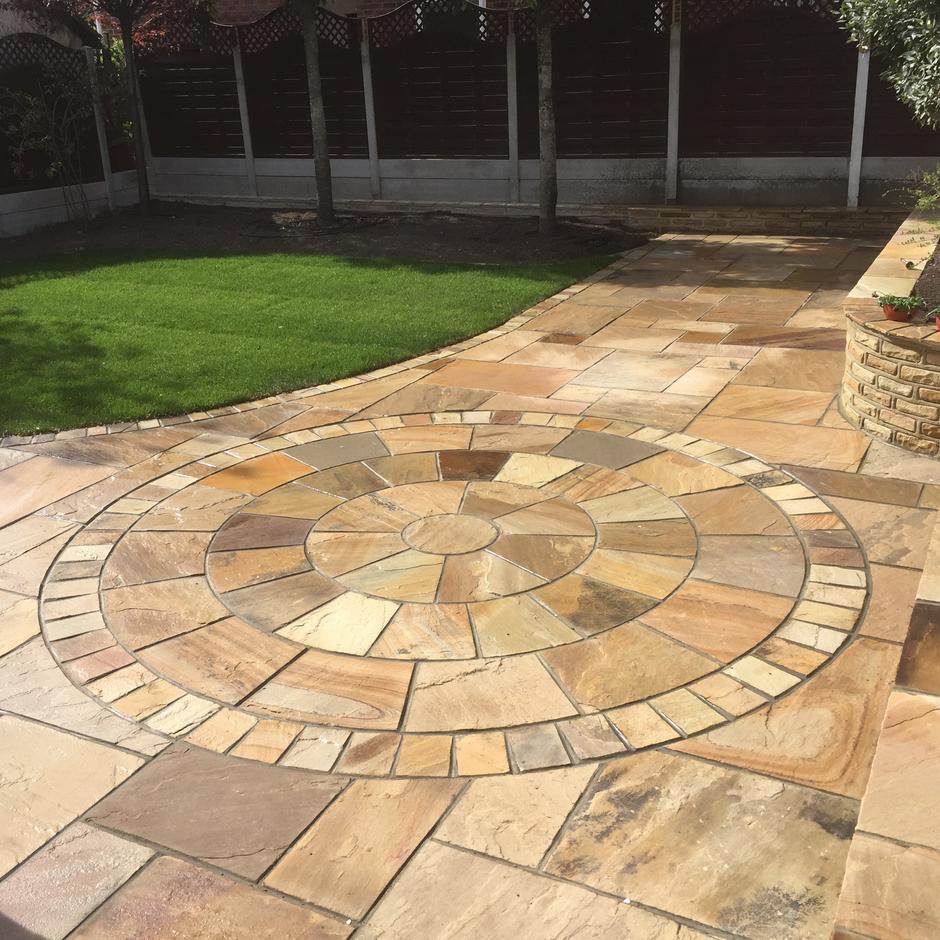 Golden Fossil Natural Stone Paving Circle Kit with cobble setts and grass turf