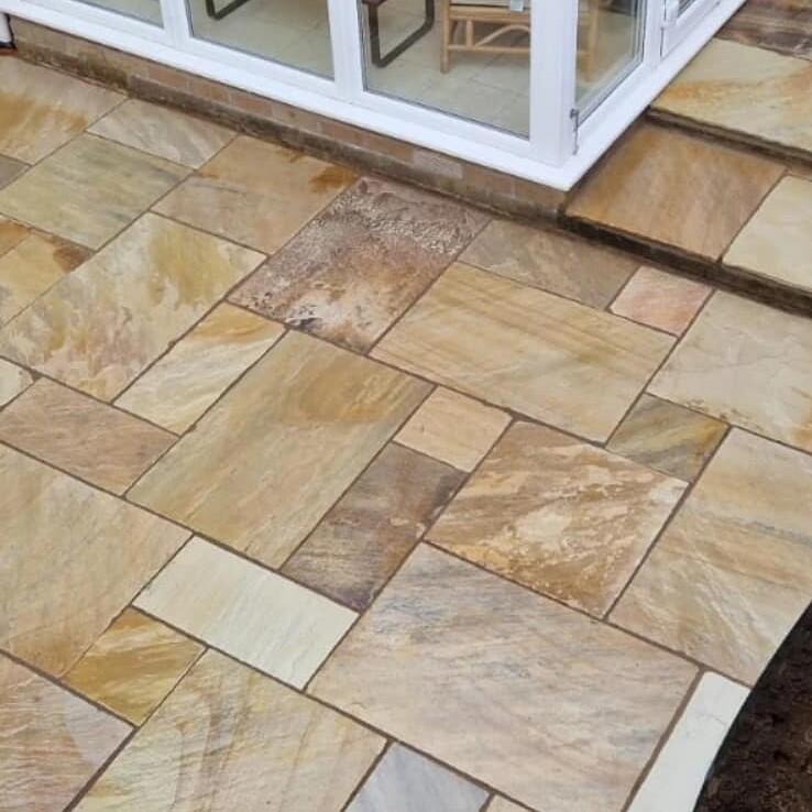 brown and beige garden paving with plants