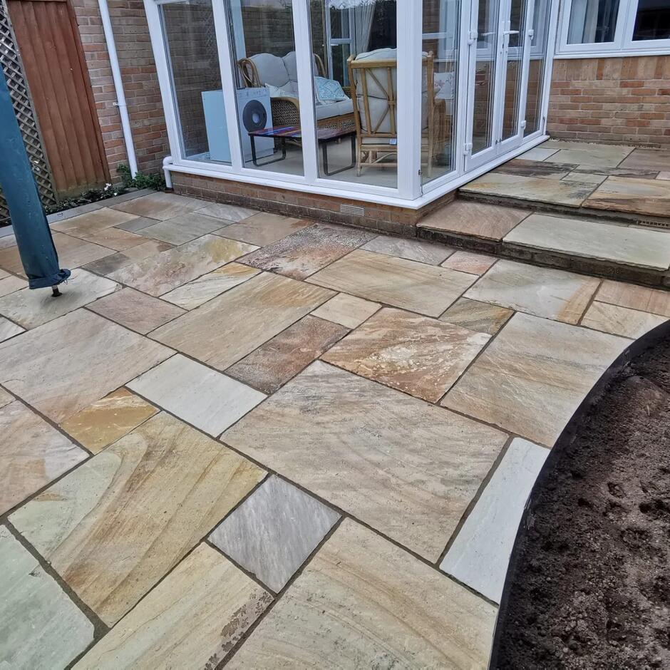 brown and beige garden paving with plants