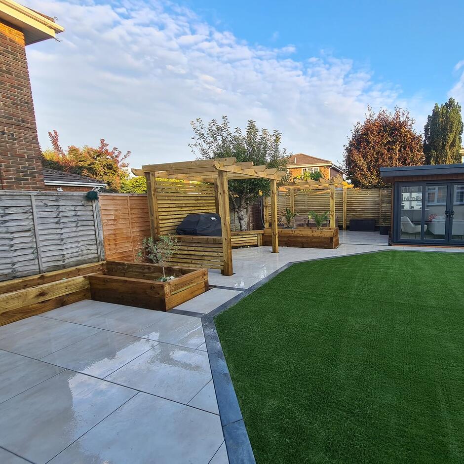 cappuccino paving in garden with grass and shed