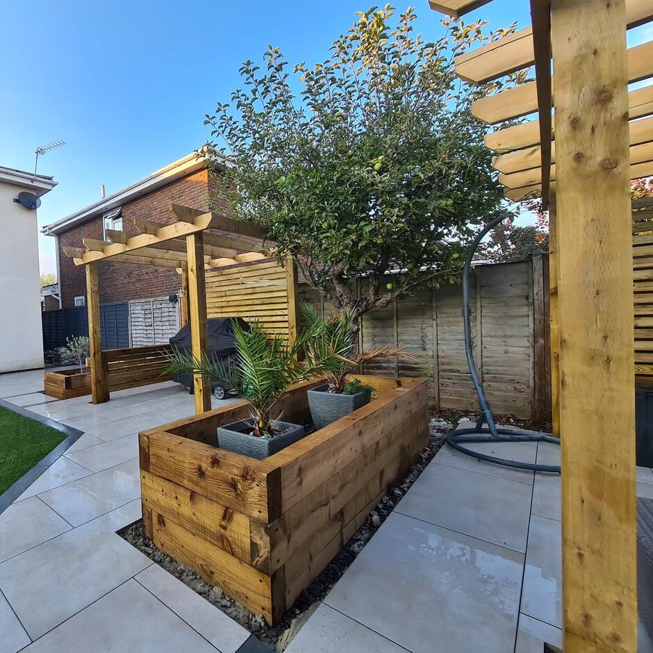 cappuccino paving in garden with grass and shed
