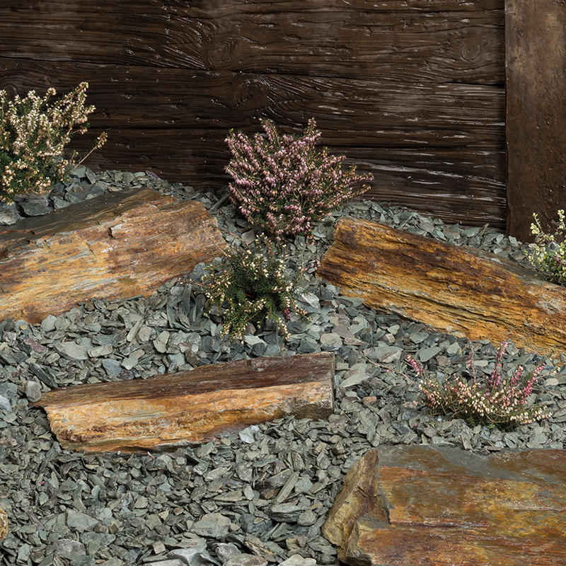 Rustic Slate Rockery garden with wooden planks and plants