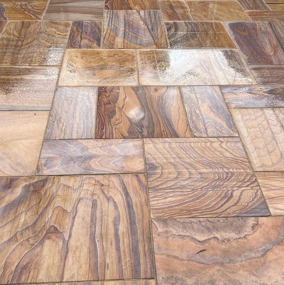 Sawn Rainbow Sandstone Paving slabs up-close