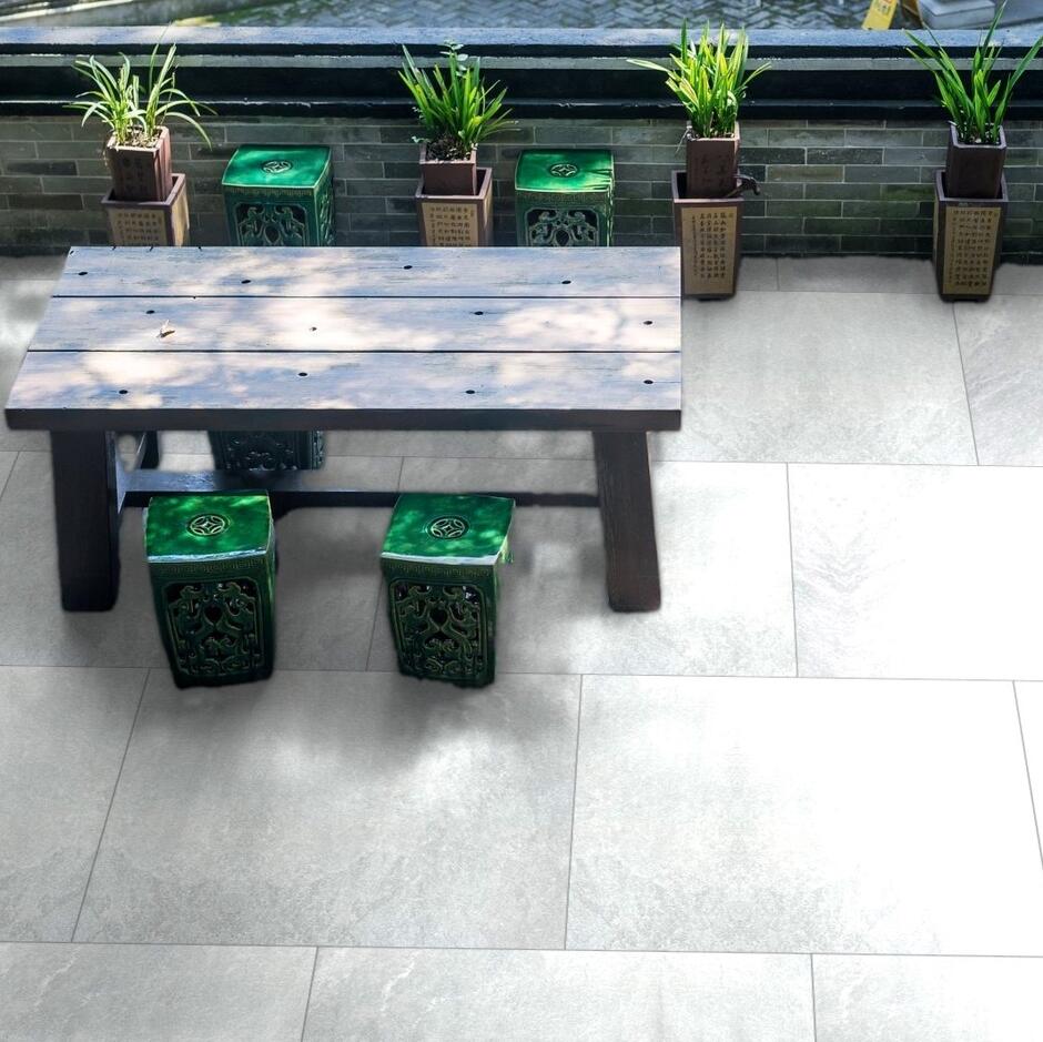 Sienna™ Jupiter Argent Porcelain Paving slabs back garden dining area