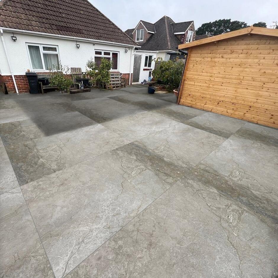 Celestial Rock Grey Porcelain Paving laid in back garden