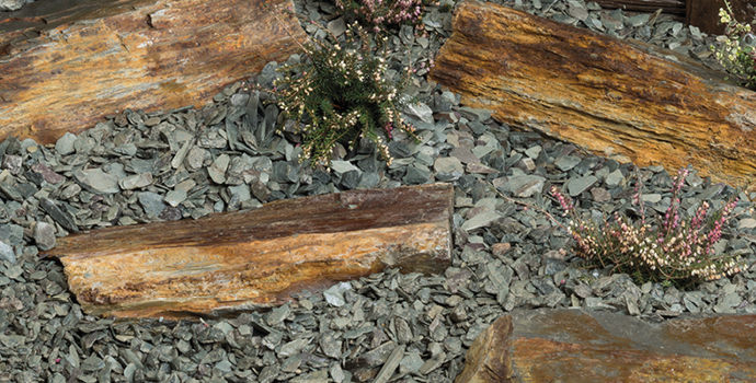image of rockery and boulders with 0% finance on your garden logo