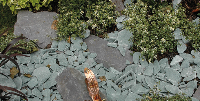 welsh slate and paddlestones collage as a decorative garden feature