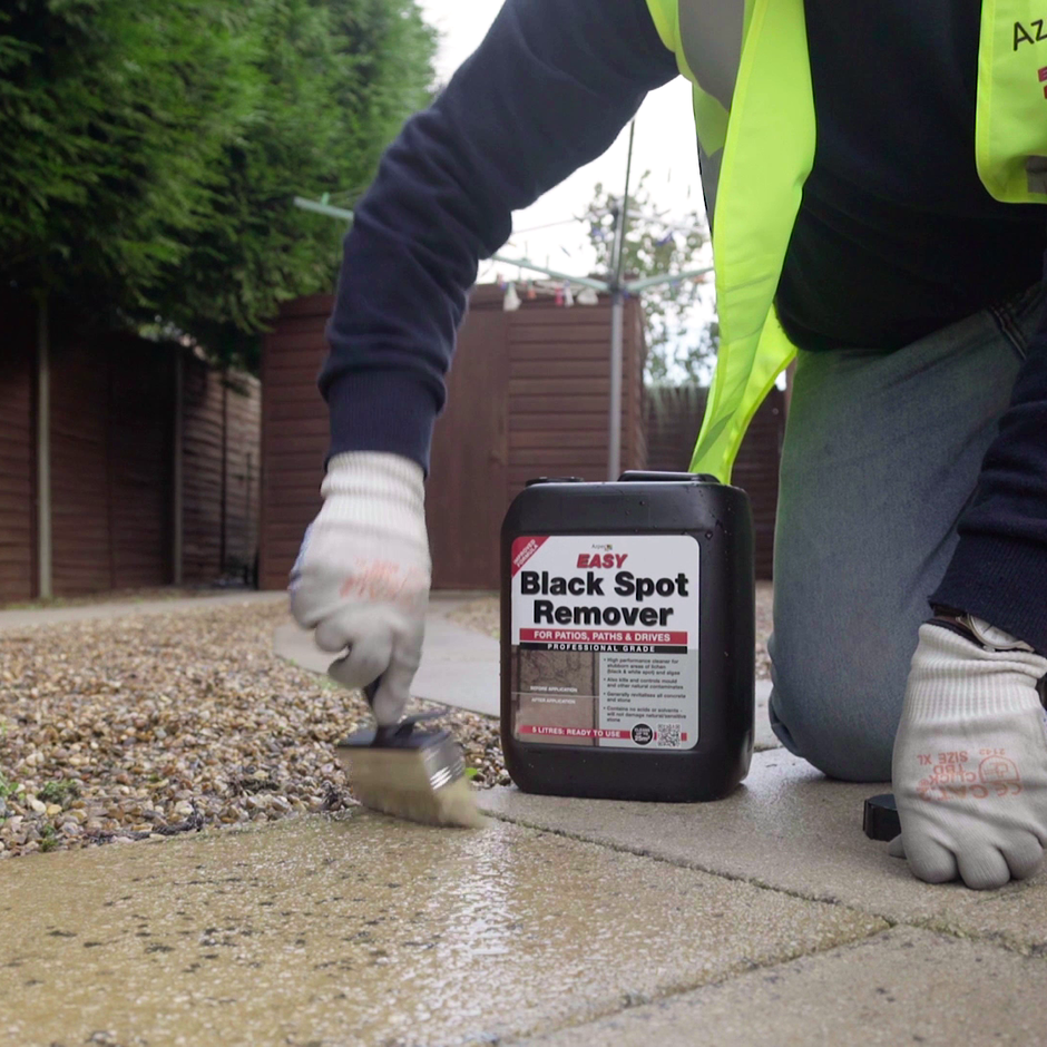 Landscaper using Azpects Easycare Black Spot Remover