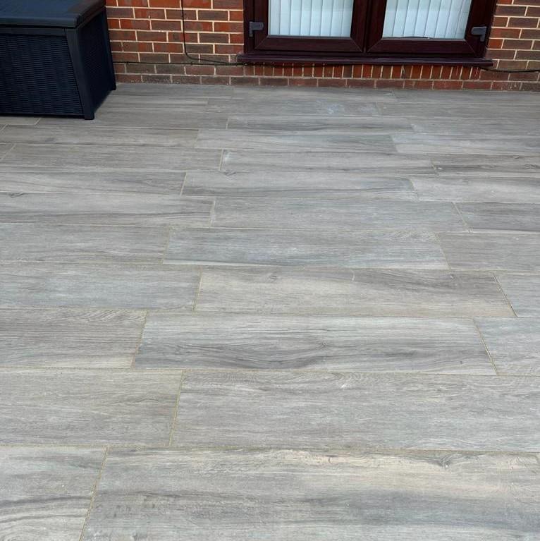 Woodland Pine Wood-Effect Porcelain Paving Planks laid back garden porch