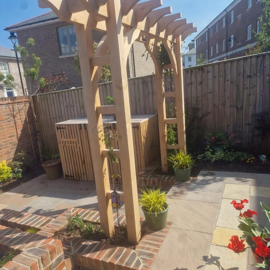 Fernlea Raj Green Sandstone Paving garden slabs with sleepers and fencing