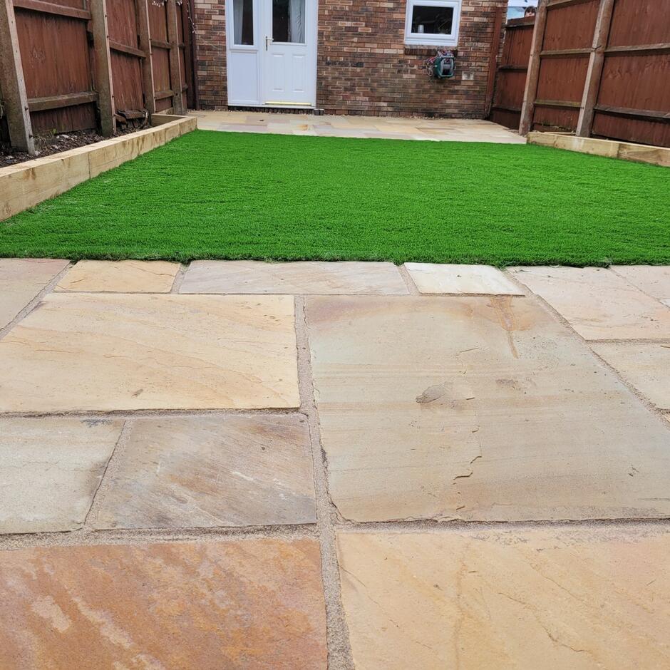 indian sandstone golden paving slabs with artificial grass