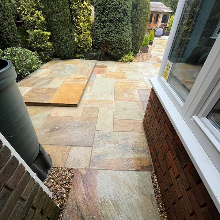 front garden patio with fossil sandstone yellow paving slabs