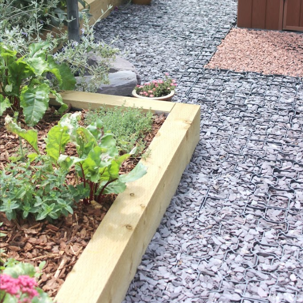 20mm plum slate with sleeper bed and bark nuggets