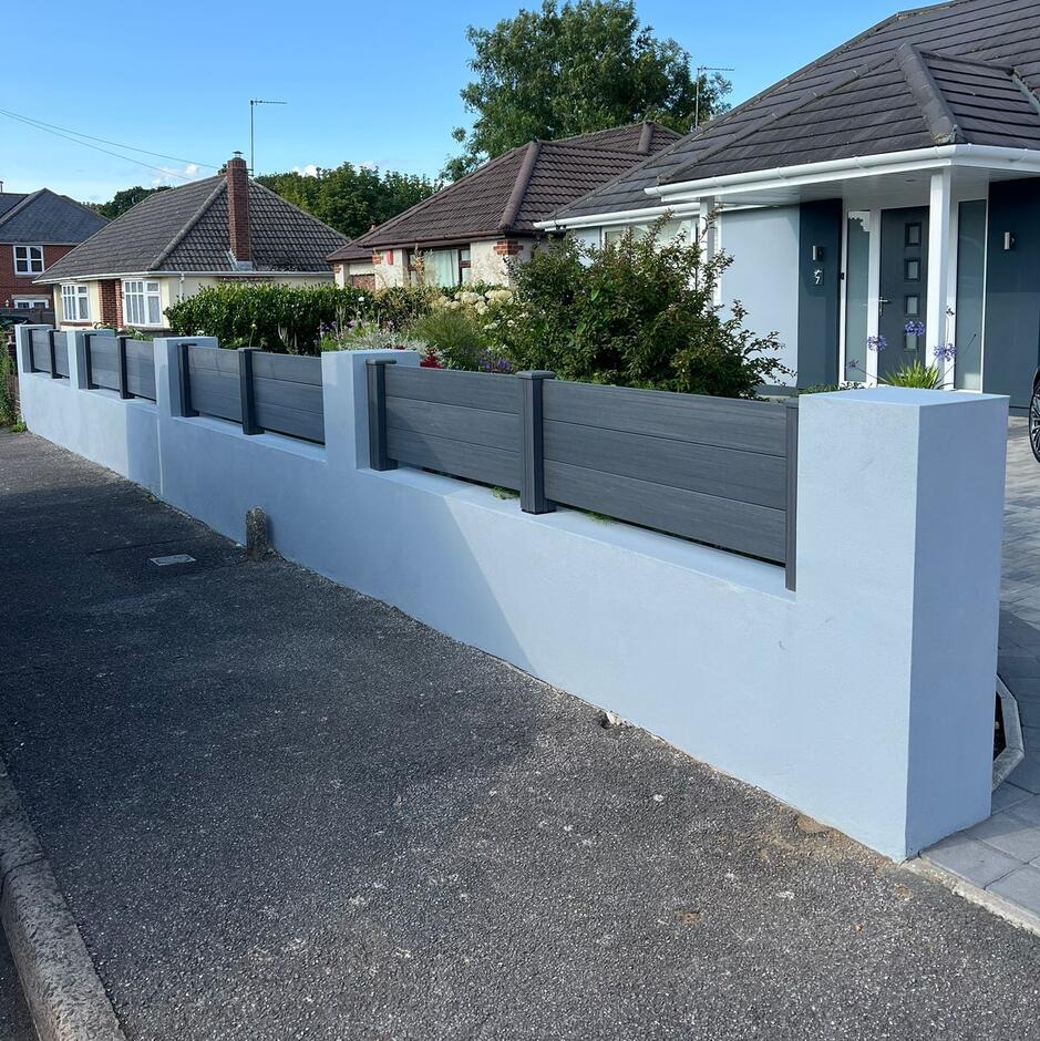 Wessex® Composite Fencing Board, Tungsten Grey, dark grey composite fencing board and post in front garden