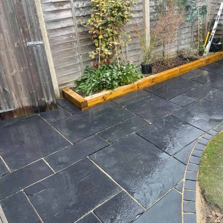 carbon black square edge paving slabs with matching cobble setts