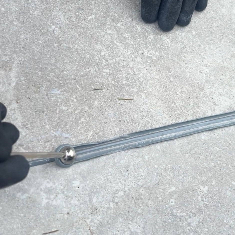 Joint-it grey grout tools being used to grey porcelain paving