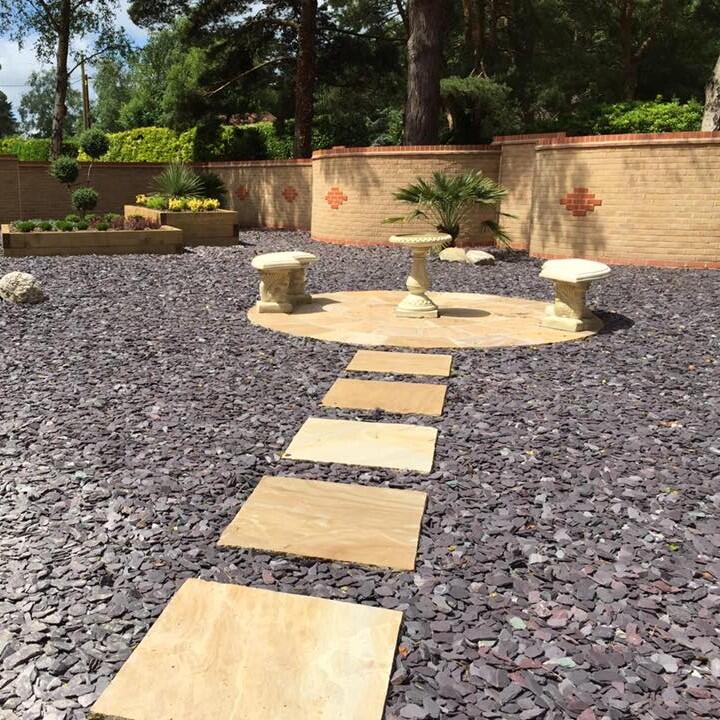 welsh blue slate in garden with paving slabs
