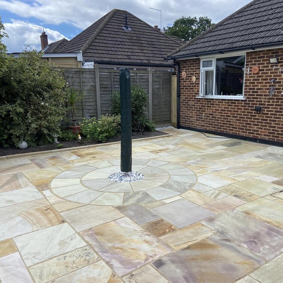 Golden Fossil Sandstone Paving; back garden patio; natural indian sandstone patio slabs; gold, beige, cream slabs with grouting
