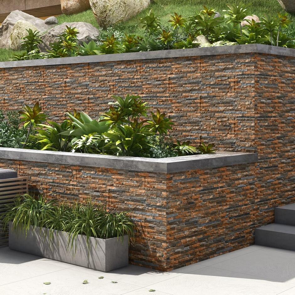 Sienna™ Rustic Quartz Porcelain Cladding in garden; rust, brick red, grey cladding pieces
