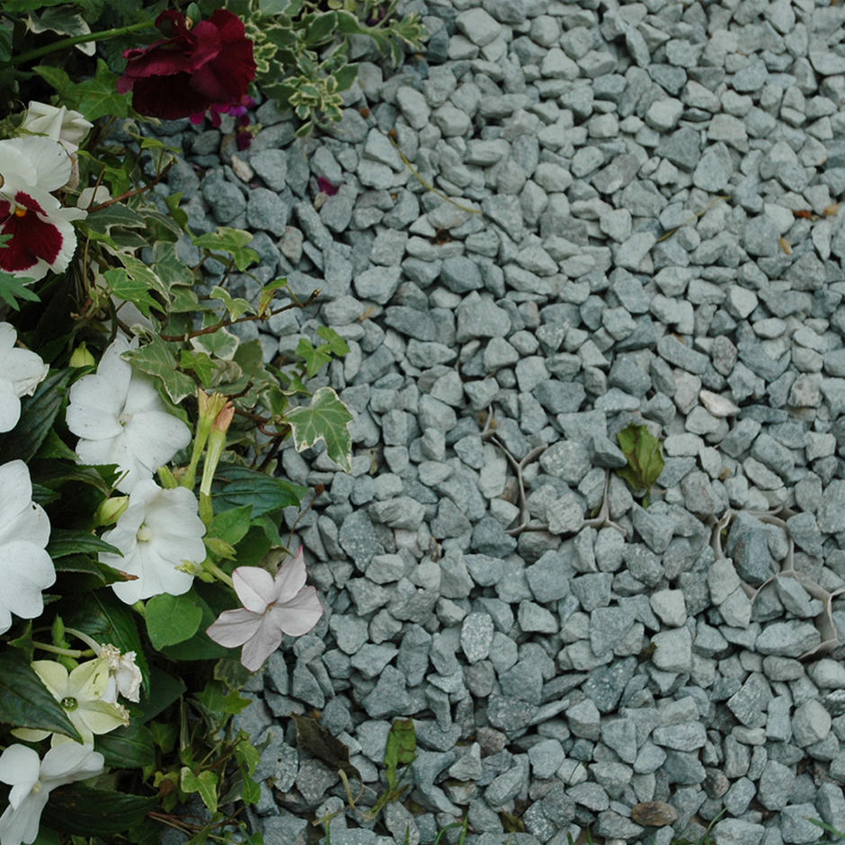 green granite chippings in flower border