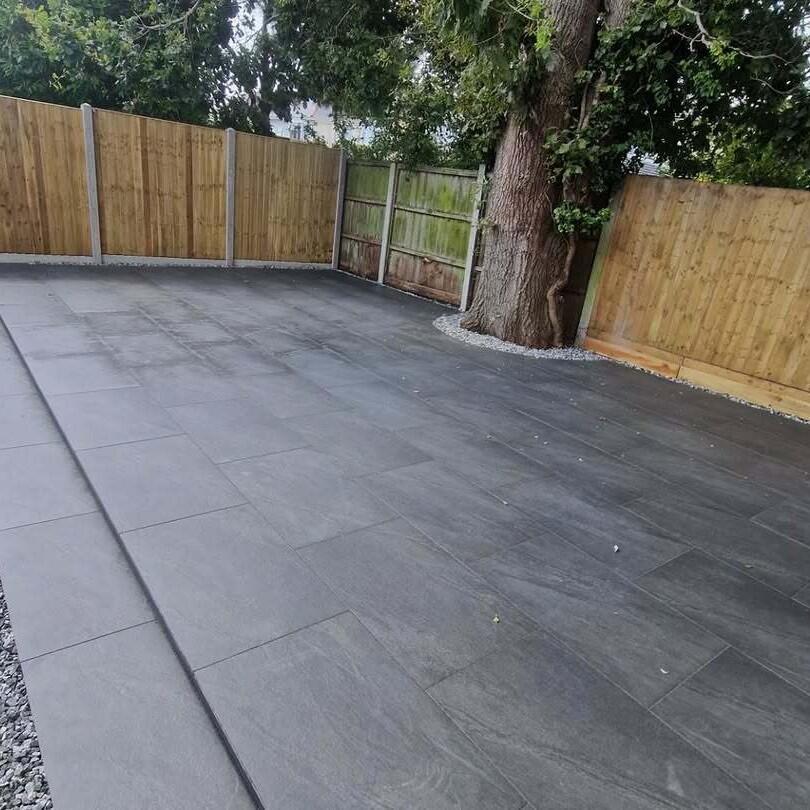 Sienna™ Anthracite Black Porcelain Paving dry slabs, back garden with steps