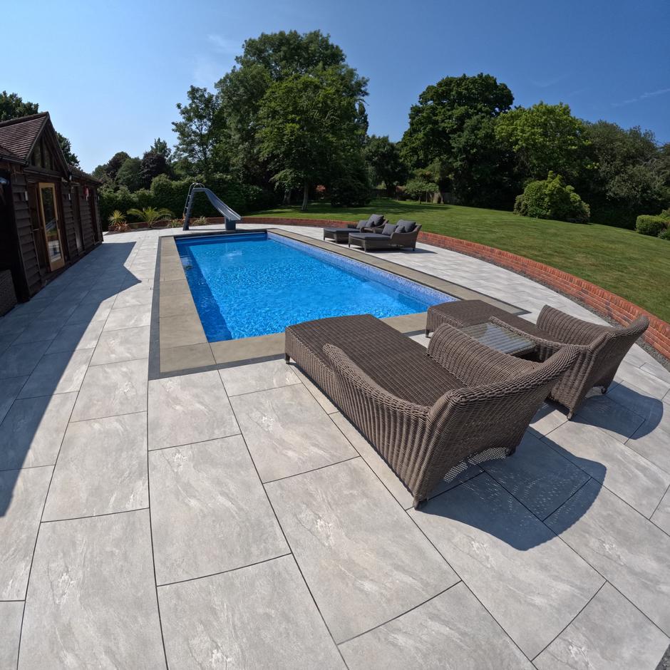 Sienna™ Jupiter Argent Porcelain Paving; classing grey tiles patio and poolside