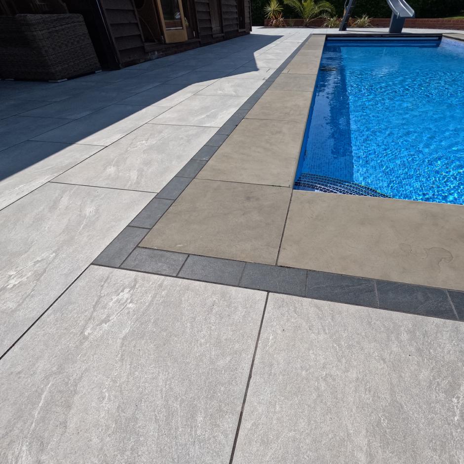 Sienna™ Jupiter Argent Porcelain Paving; light grey patio tiles, r11 non skid rating for pool side