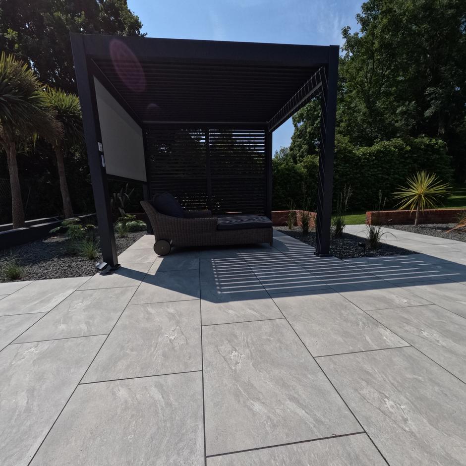 Sienna™ Jupiter Argent Porcelain Paving, grey luxury porcelain tiles with pergola