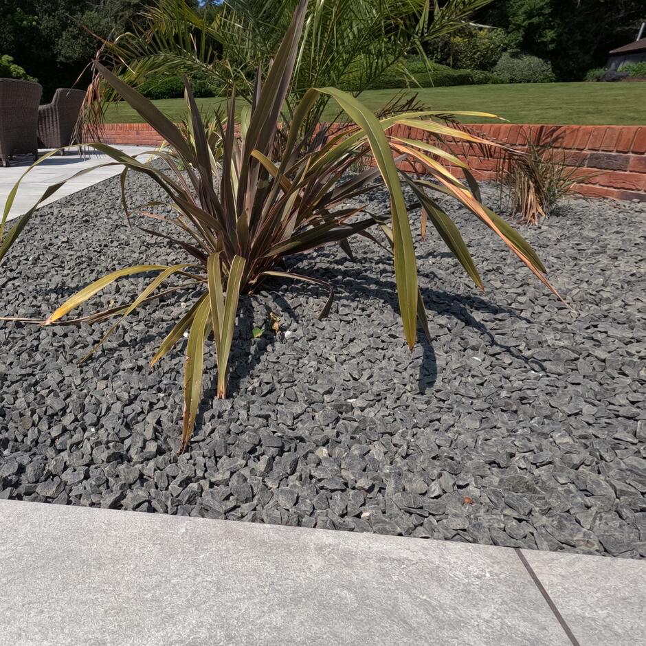 Black Basalt Chippings 20mm; dark grey, charcoal 20mm stones for garden border with plants features