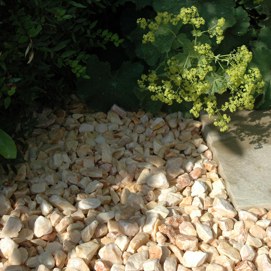 beige peach coloured garden stones feature