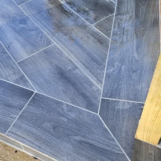 Woodland wood-effect Anthracite Grey Black Porcelain Paving Slab up-close paving planks