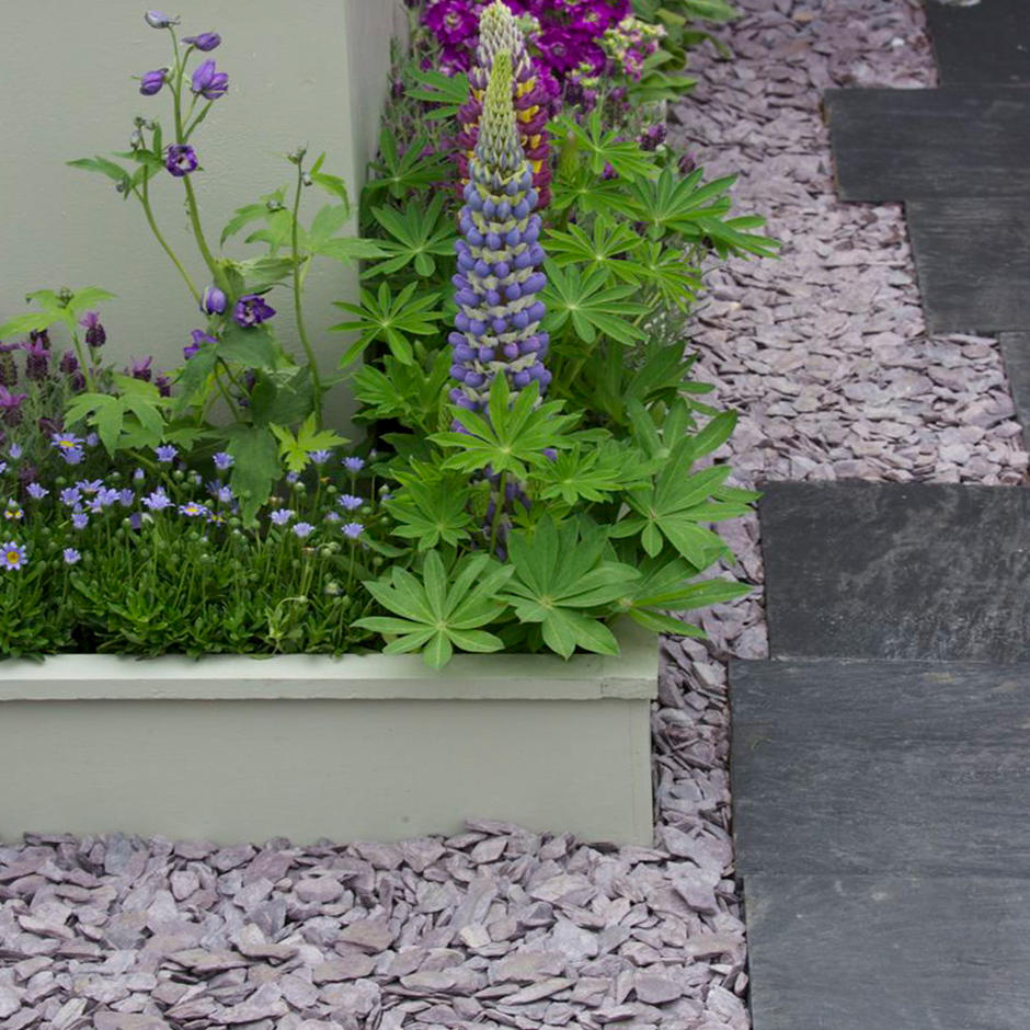 20mm Plum slate as a garden border with flowers