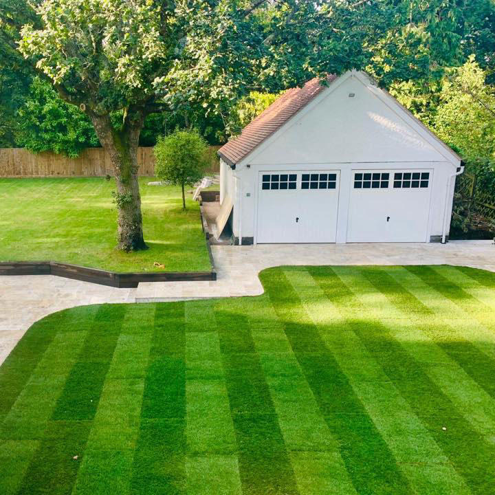 Wessex® Coolfresh Turf installed as stripes in garden